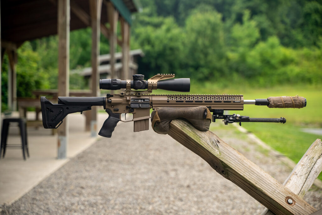 Modular suppressor with a muzzle brake threaded onto the Evolution competition rifle barrel
